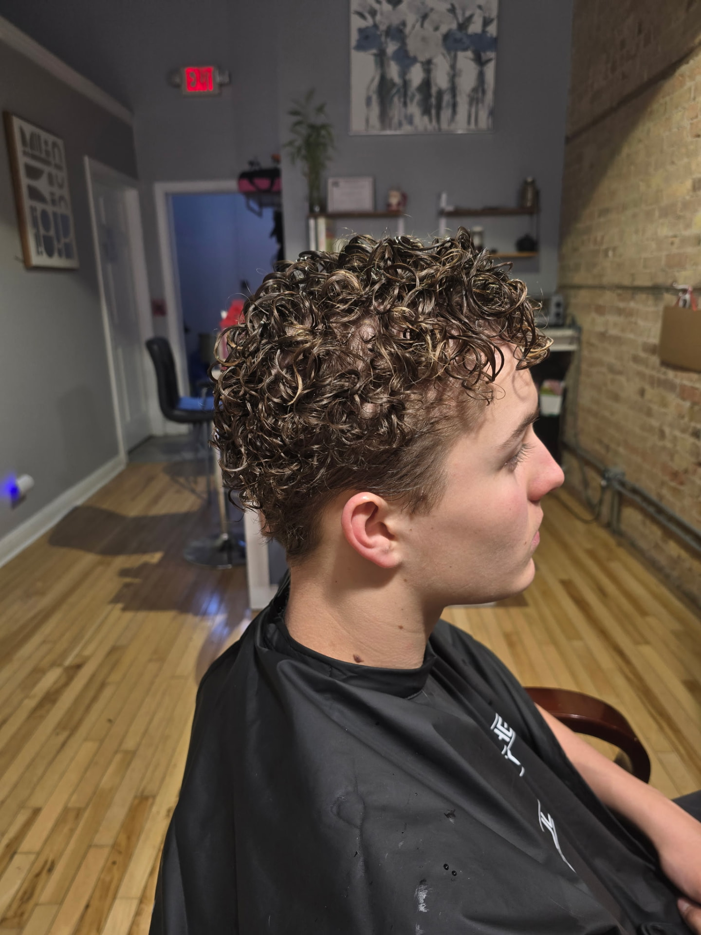 Full perm with defined curls by Studio K Hair Studio in Lockport IL